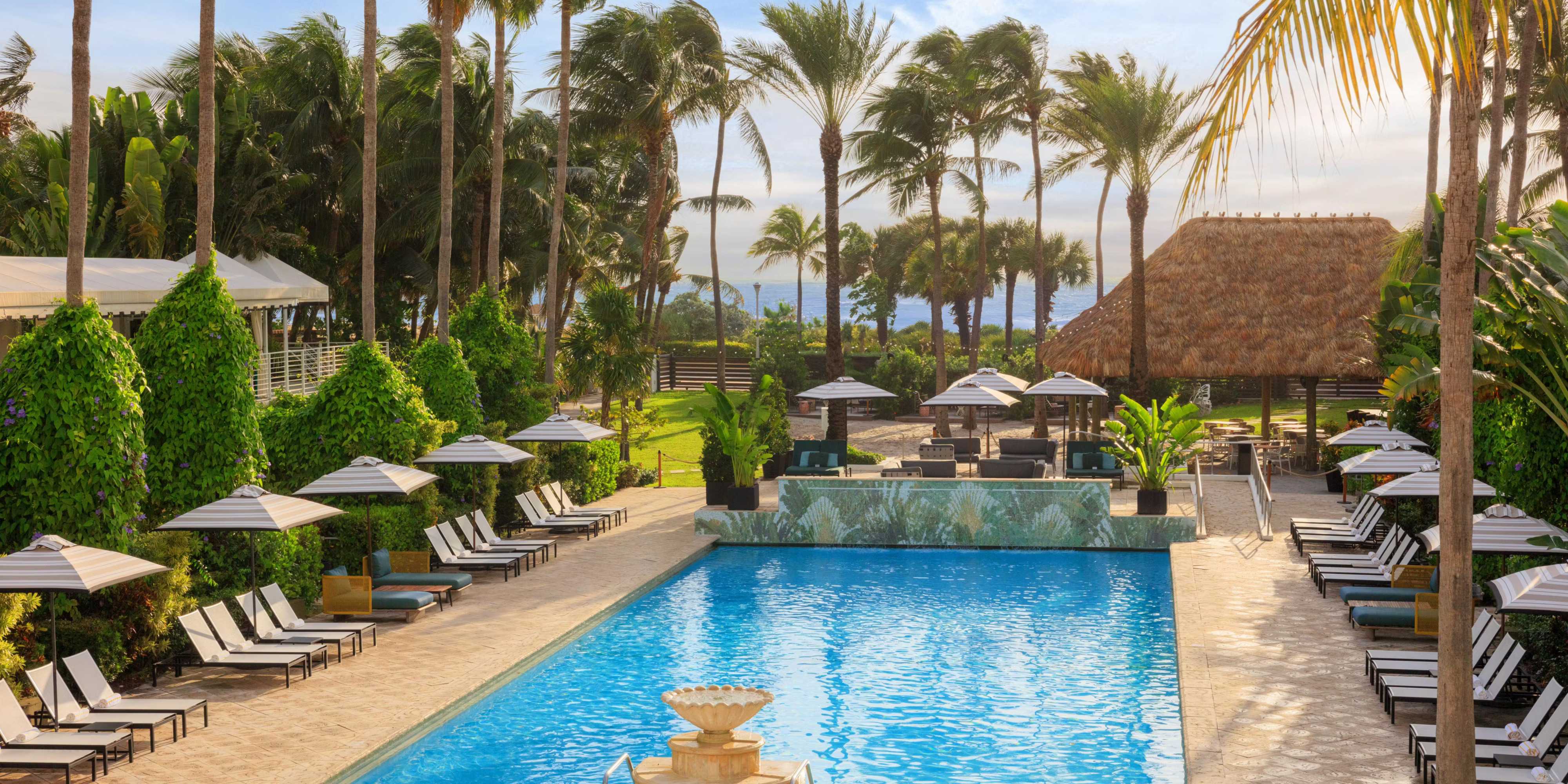 Resort hotel pool at sunset
